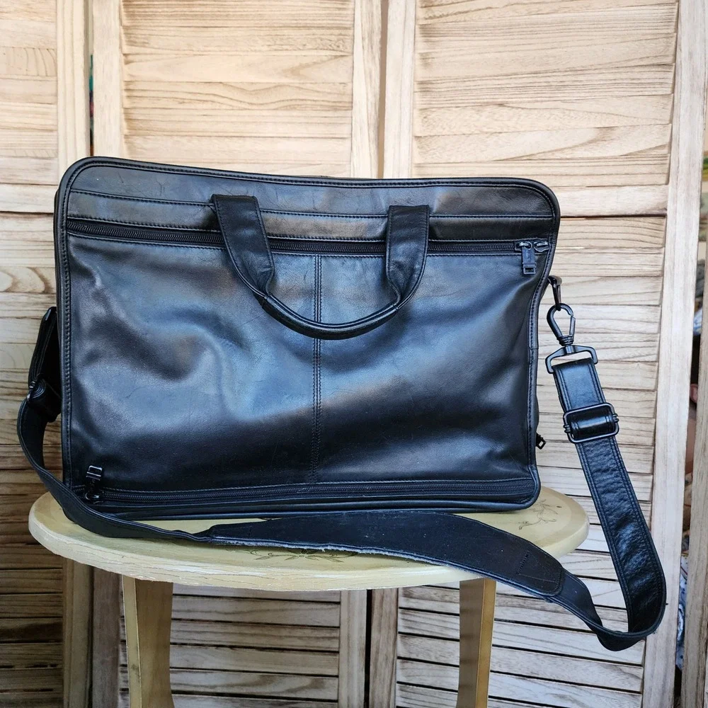 Tumi black leather